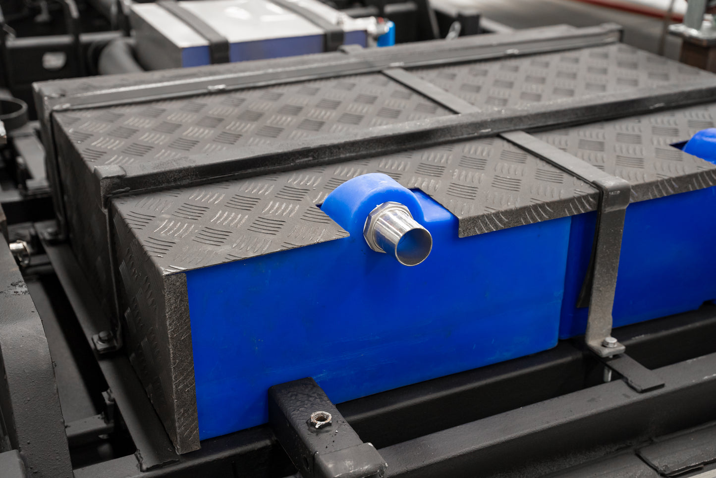 Skid plate for water tank